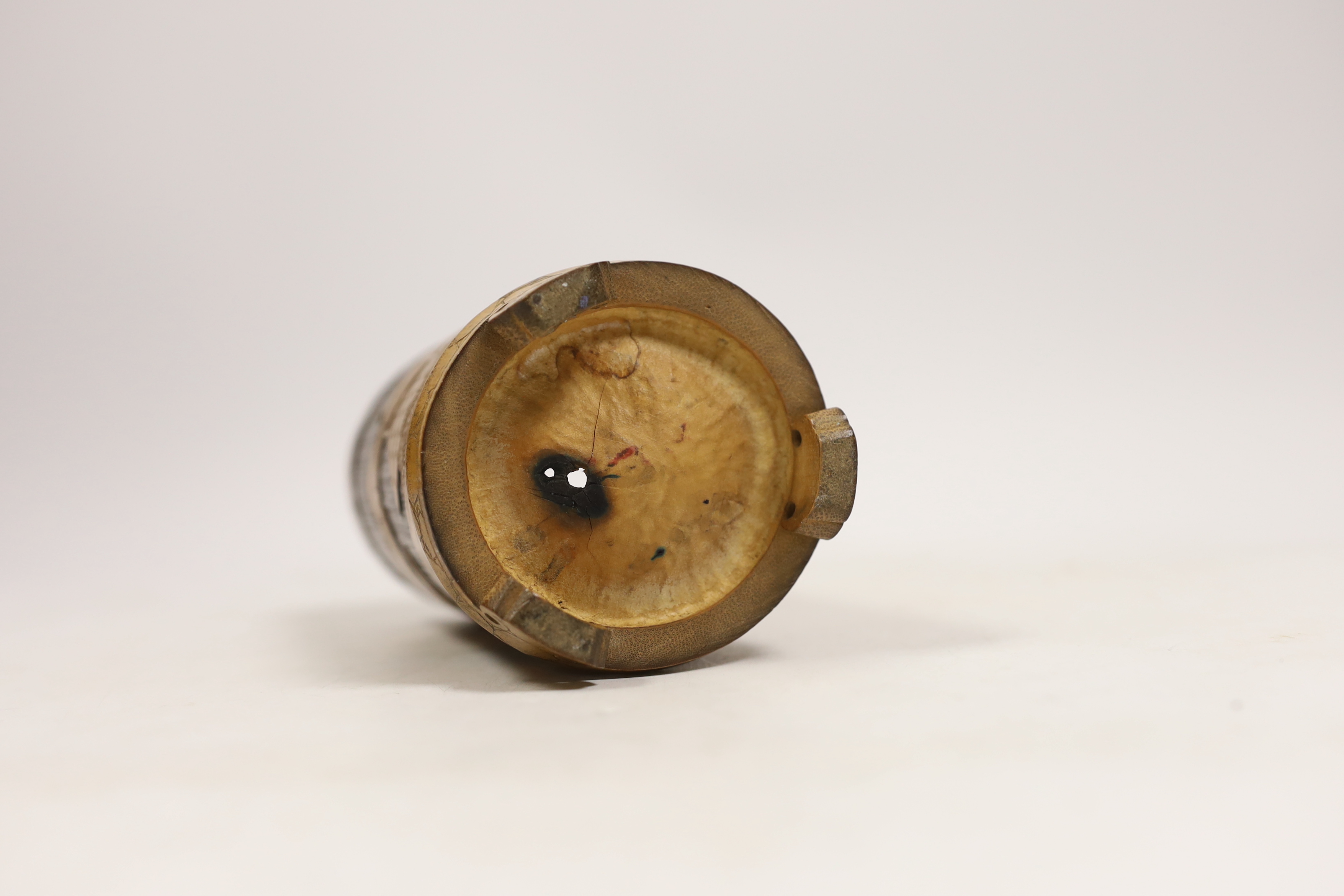 A Japanese bamboo brushpot carved with mountains and pagodas, 13cm high